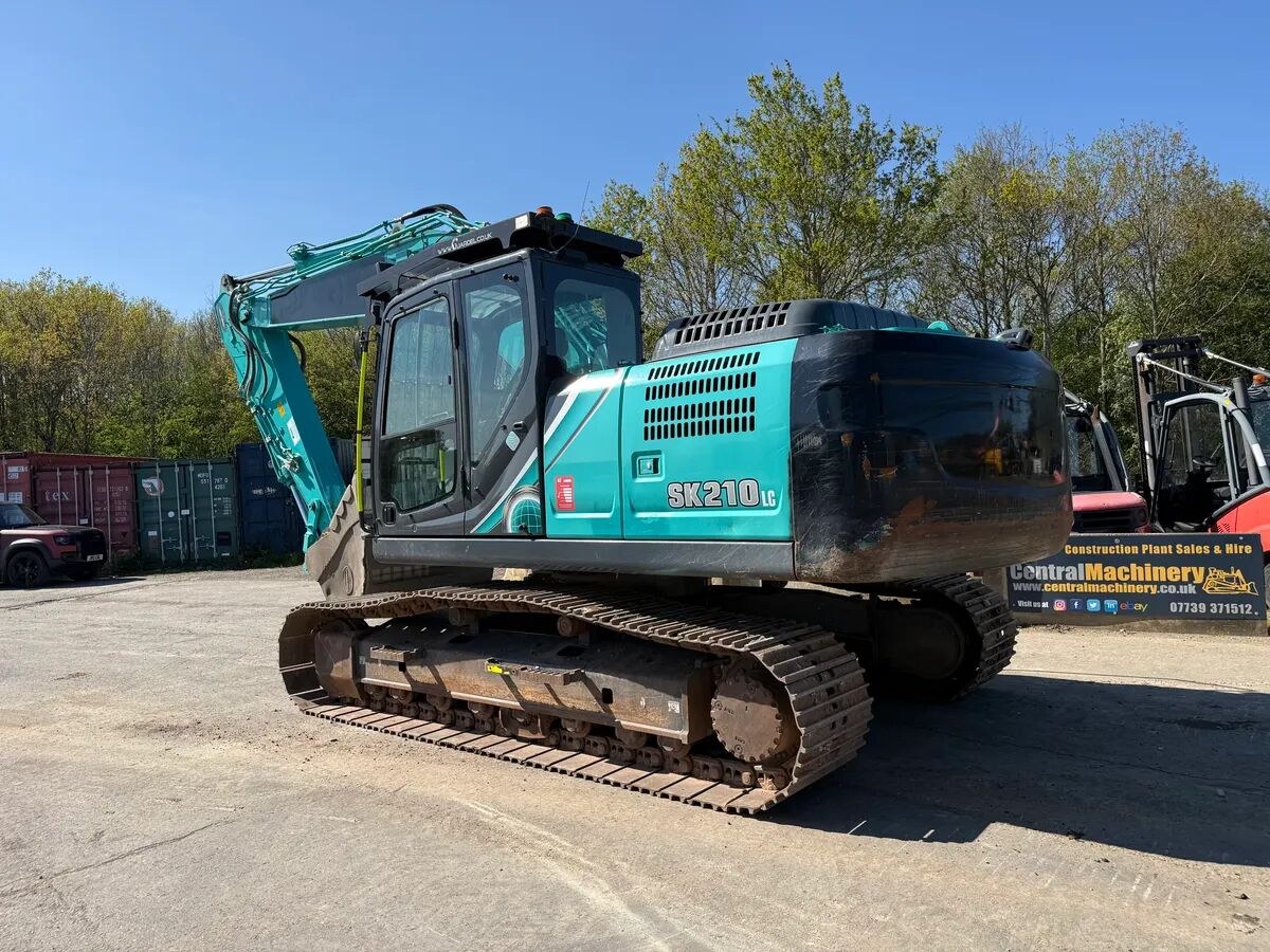 2021 Kobelco SK210LC-10 crawler excavator, rear three-quarter view 2021 Kobelco SK210LC-10 crawler excavator, rear three-quarter view