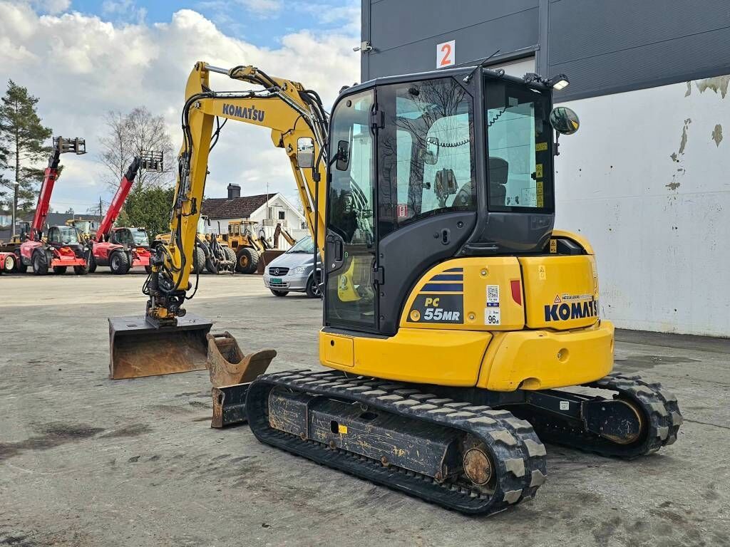 2020 Komatsu PC55MR-5 mini excavator, rear three-quarter view 2020 Komatsu PC55MR-5 mini excavator, rear three-quarter view
