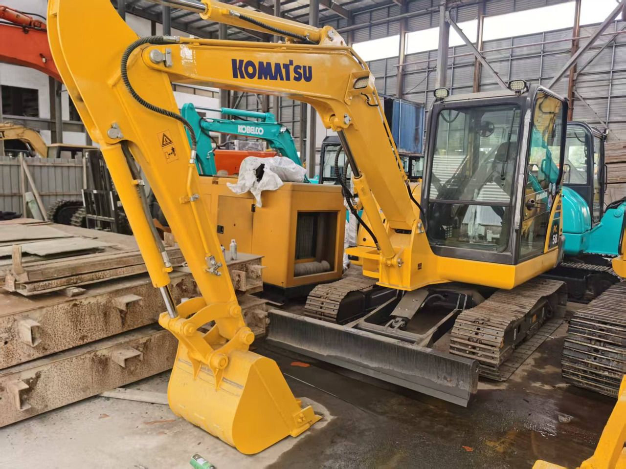 2015 Komatsu PC58 mini excavator, front three-quarter view 2015 Komatsu PC58 mini excavator, front three-quarter view