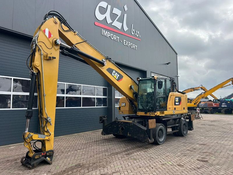 2015 Caterpillar MH3022 material handler, side view