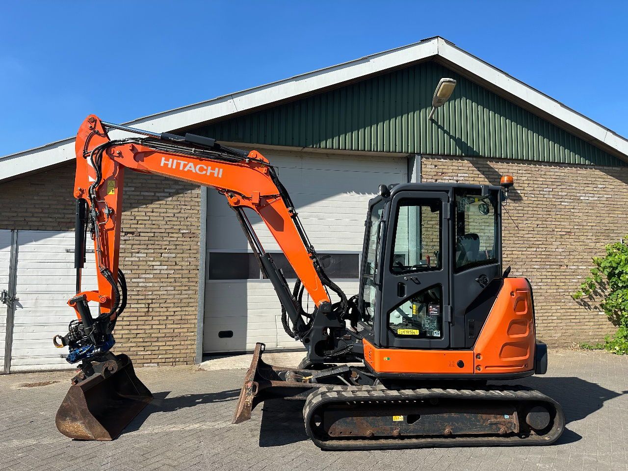 2015 Hitachi ZX65USB-5A mini excavator side view