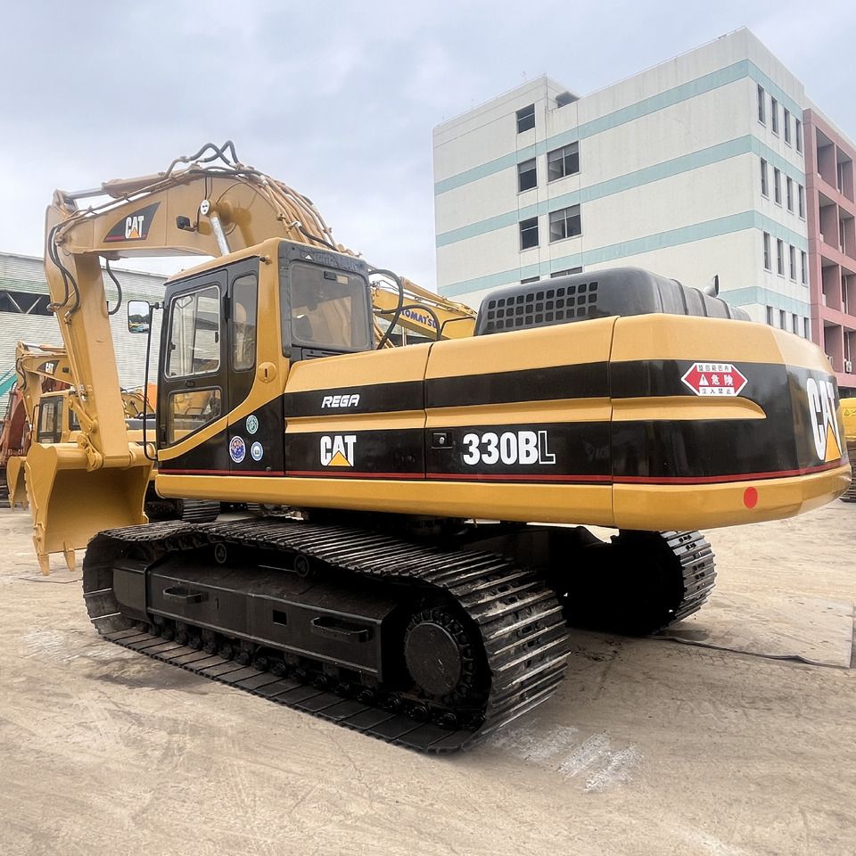 Caterpillar 330BL crawler excavator, rear three-quarter view Caterpillar 330BL crawler excavator, rear three-quarter view
