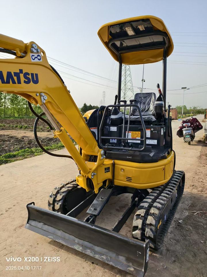 2023 Komatsu 20MR mini excavator, rear three-quarter view 2023 Komatsu 20MR mini excavator, rear three-quarter view