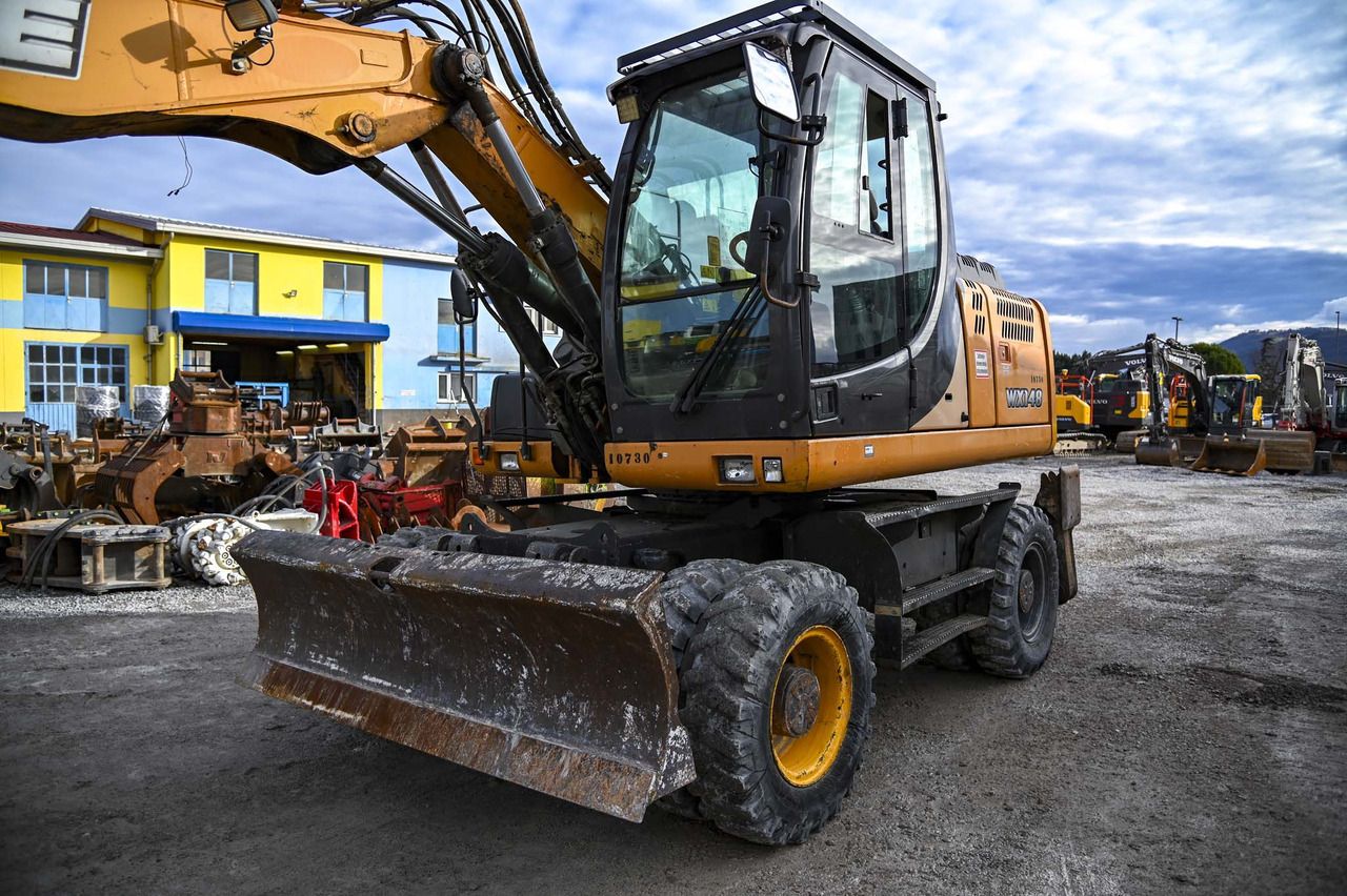 2017 CASE WX148 wheel excavator, front three-quarter view 2017 CASE WX148 wheel excavator, front three-quarter view