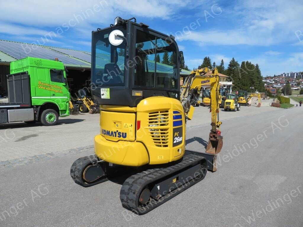 2020 Komatsu PC26 MR-5 mini excavator, rear three-quarter view 2020 Komatsu PC26 MR-5 mini excavator, rear three-quarter view