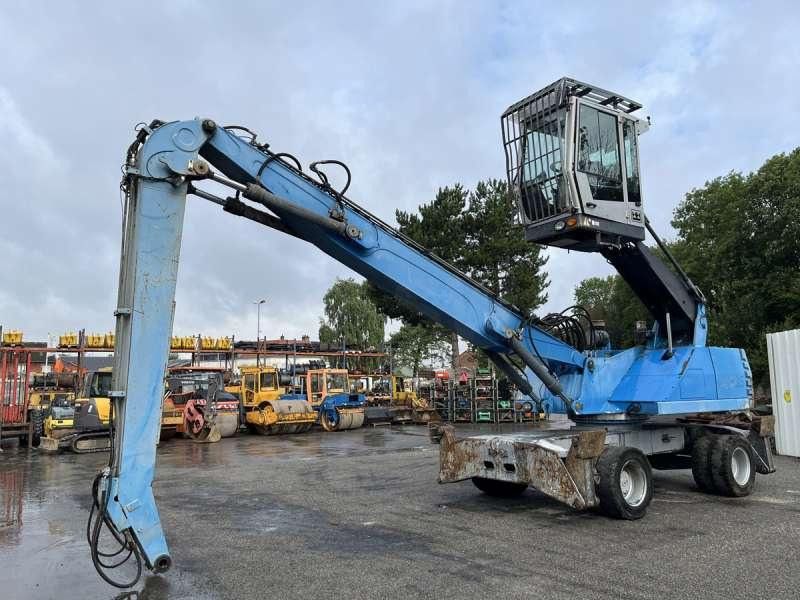2011 Fuchs MHL335 material handler, side profile view