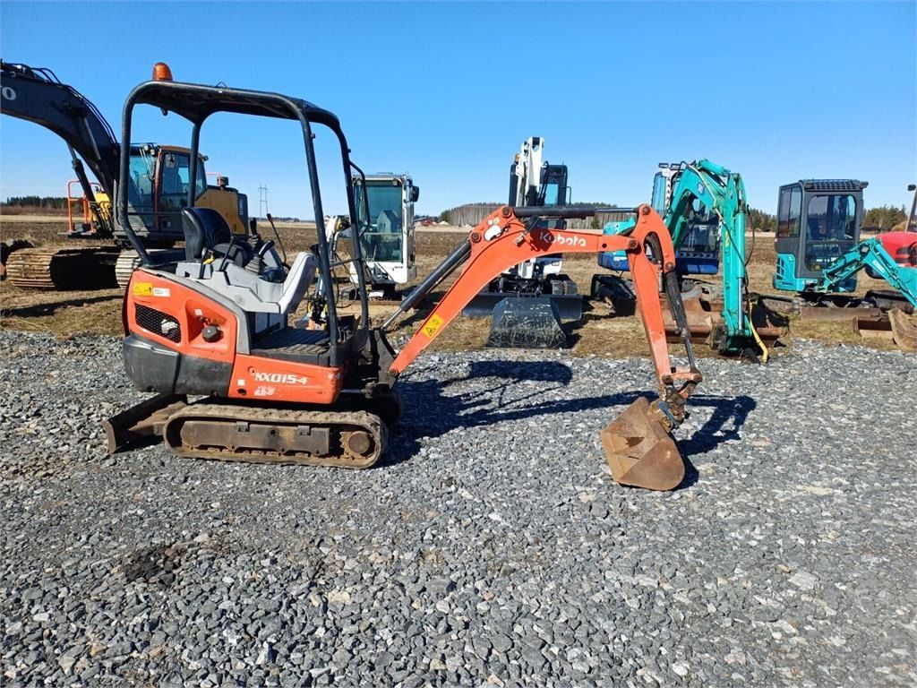2013 Kubota KX015-4 mini excavator, side view 2013 Kubota KX015-4 mini excavator, side view