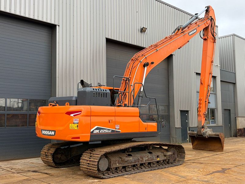 2022 Doosan DX225LC-7 crawler excavator, rear three-quarter view 2022 Doosan DX225LC-7 crawler excavator, rear three-quarter view