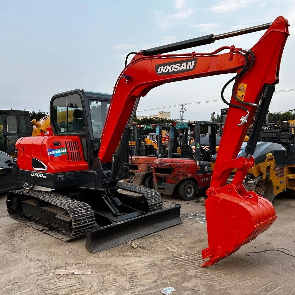 2023 Doosan DX60-9C mini excavator, three-quarter view 2023 Doosan DX60-9C mini excavator, three-quarter view