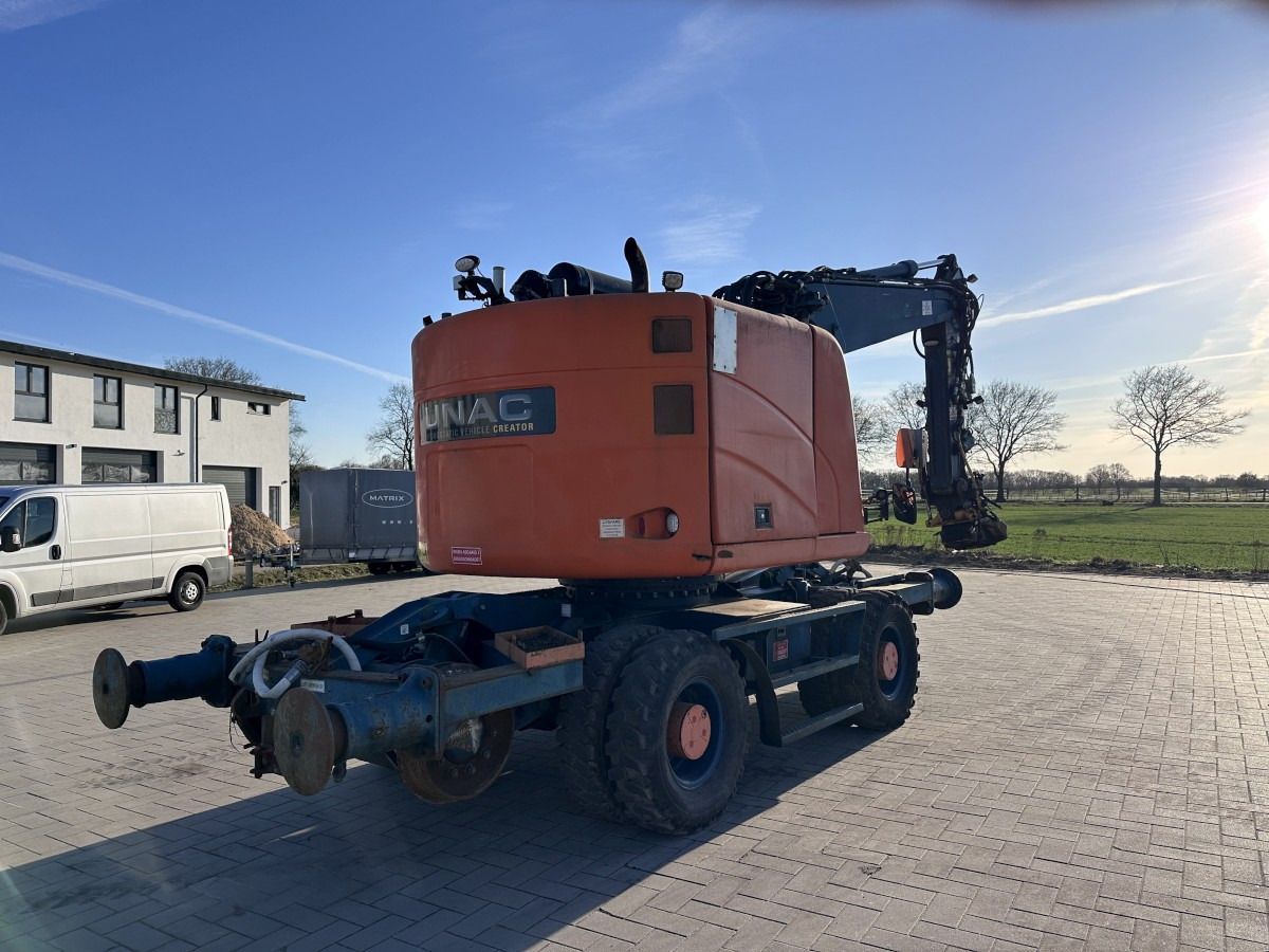 2015 Unac 22 TRR ZW wheel excavator, rear three-quarter view