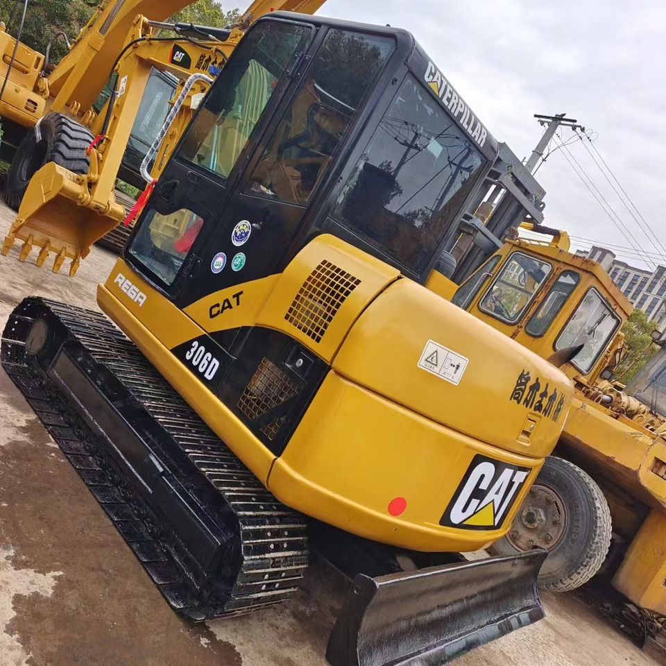 2022 Caterpillar 306D mini excavator, rear three-quarter view 2022 Caterpillar 306D mini excavator, rear three-quarter view
