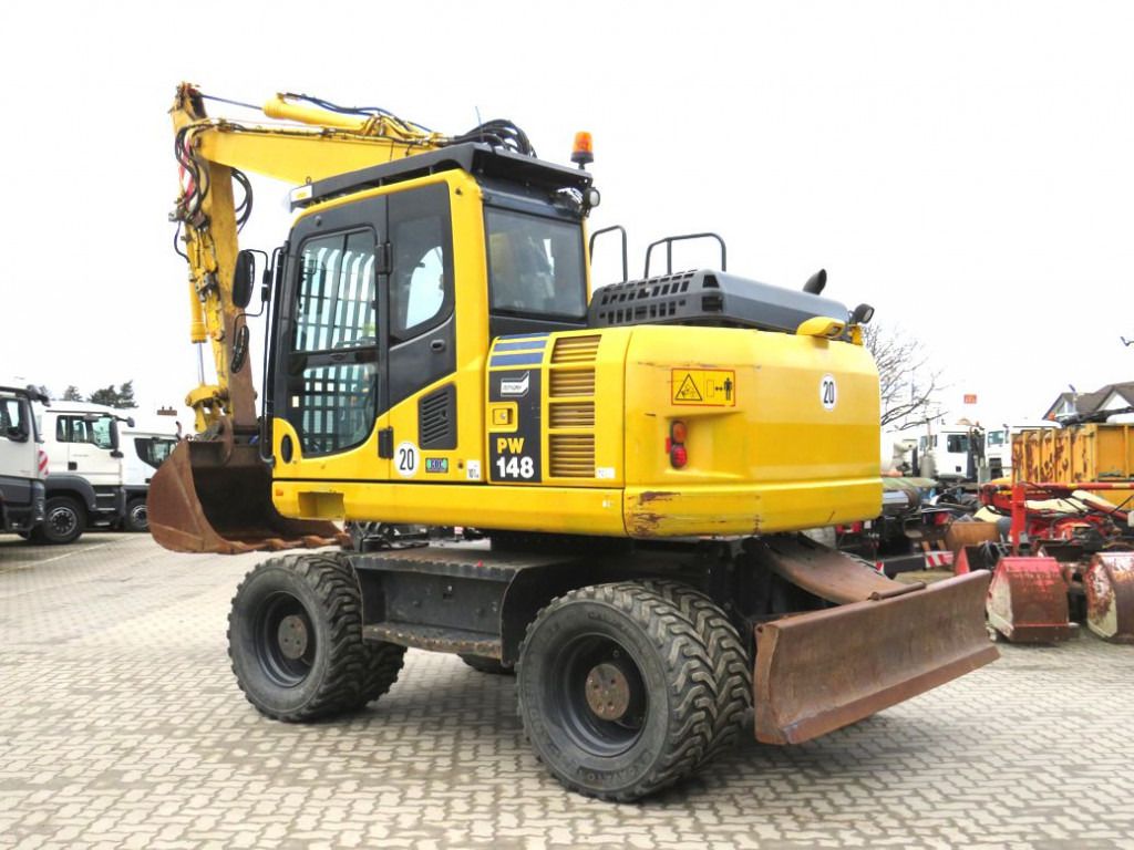 2016 Komatsu PW148-8 wheel excavator, rear three-quarter view