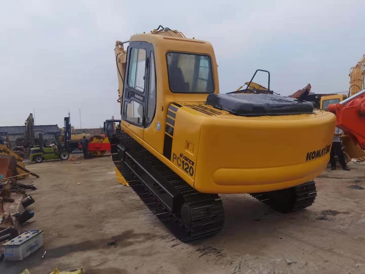 2008 Komatsu PC120-6 crawler excavator, rear three-quarter view 2008 Komatsu PC120-6 crawler excavator, rear three-quarter view