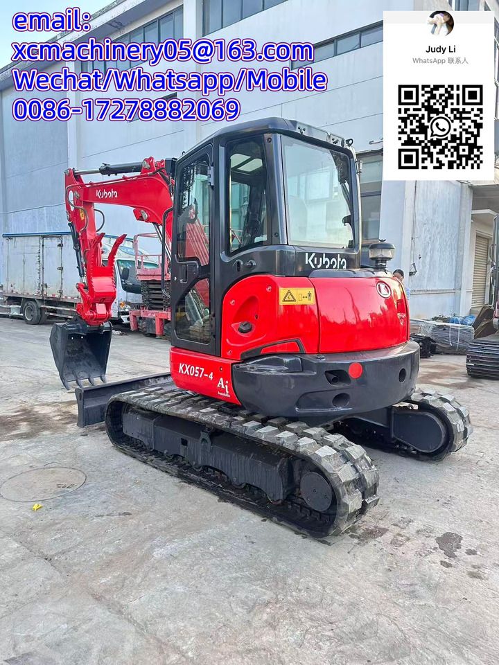 2023 Kubota KX057-4 mini excavator, front three-quarter view 2023 Kubota KX057-4 mini excavator, front three-quarter view