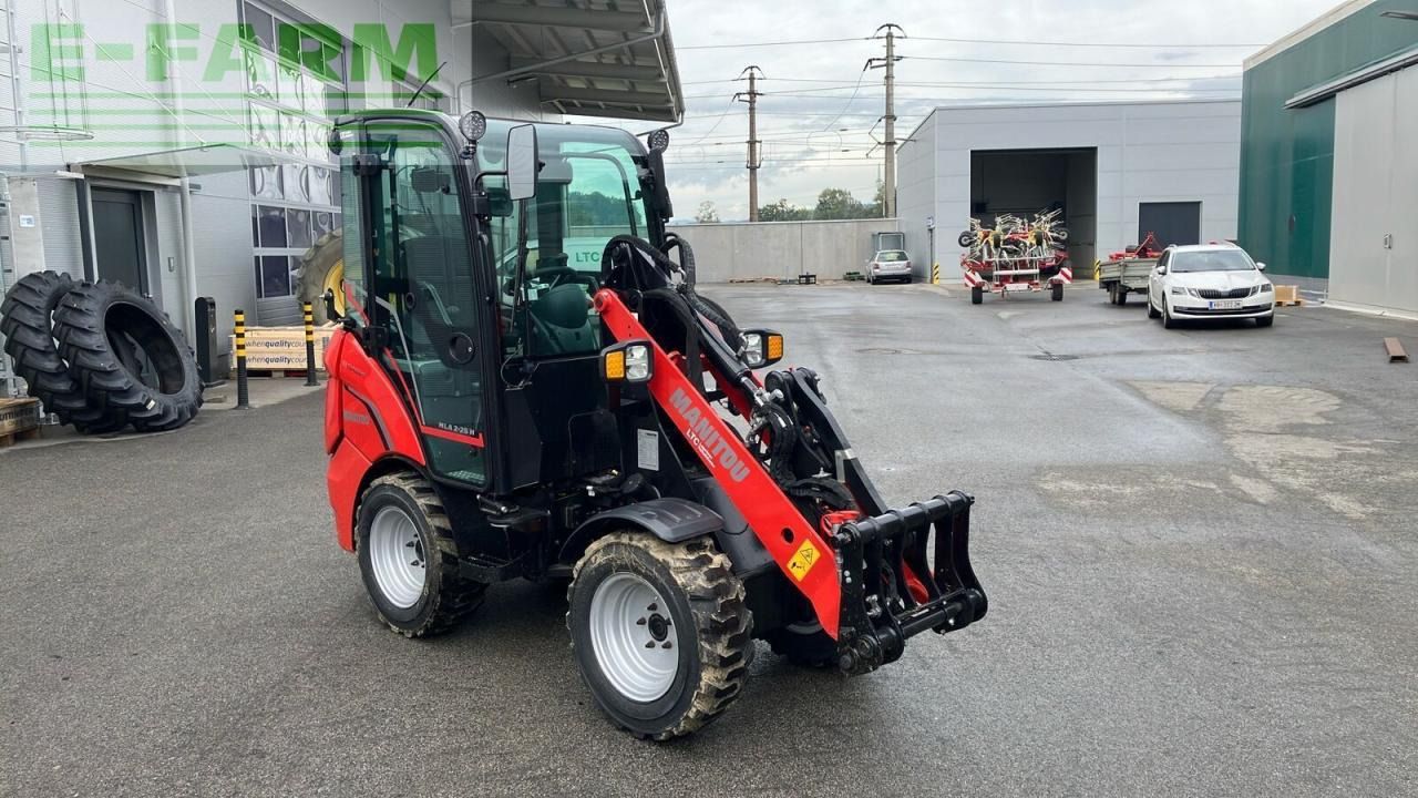 2023 Manitou MLA 2-25 H mini excavator, front three-quarter view 2023 Manitou MLA 2-25 H mini excavator, front three-quarter view