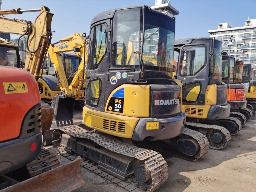 2023 Komatsu PC50 MR mini excavator, rear three-quarter view 2023 Komatsu PC50 MR mini excavator, rear three-quarter view