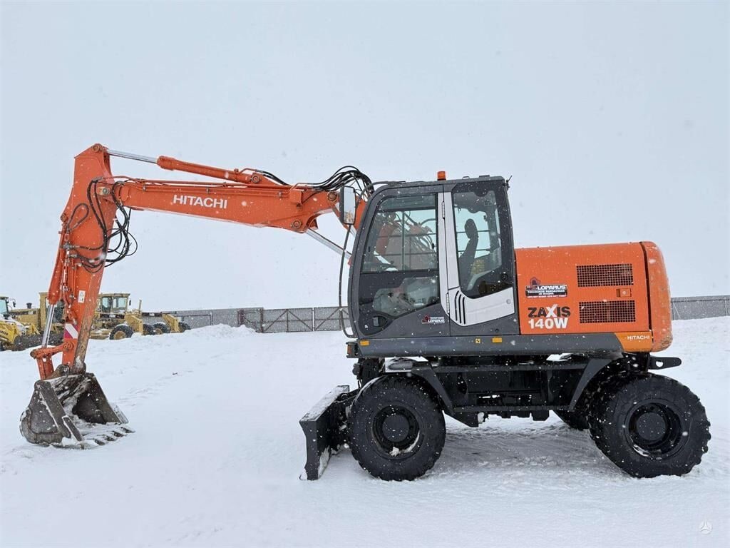 2010 Hitachi Zaxis 140W wheel excavator, side view 2010 Hitachi Zaxis 140W wheel excavator, side view