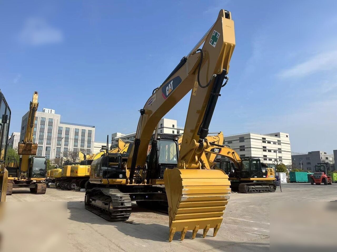 2024 Caterpillar 325DL crawler excavator, front three-quarter view