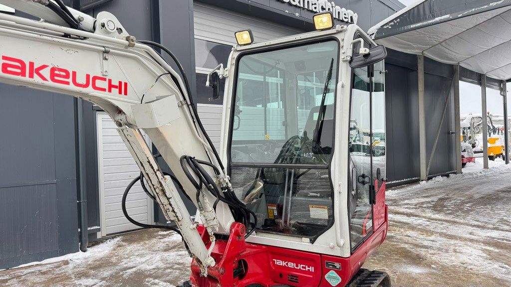 2017 Takeuchi TB230 mini excavator cab and boom view