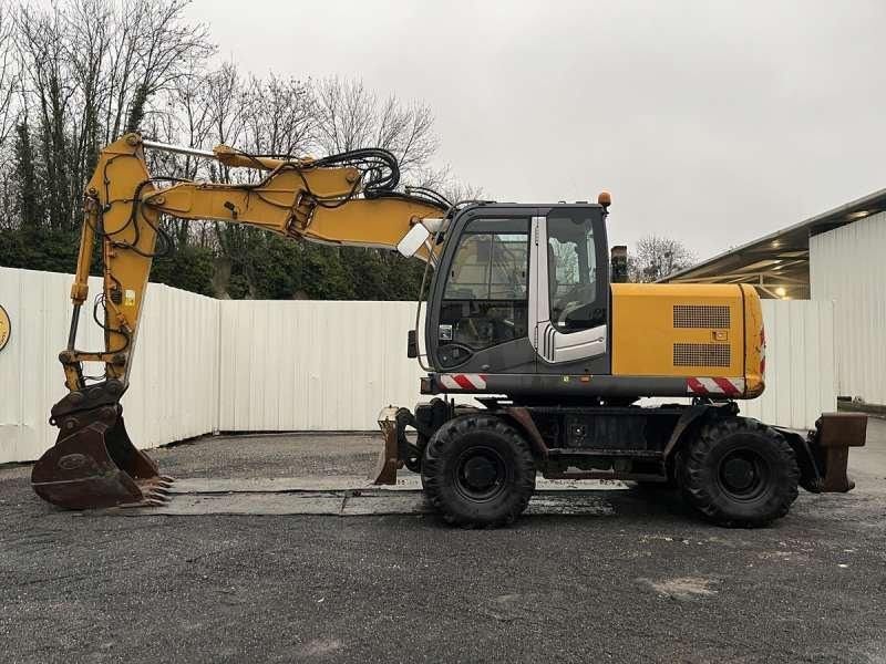 2010 Hitachi ZX140W-3 wheel excavator, side view 2010 Hitachi ZX140W-3 wheel excavator, side view