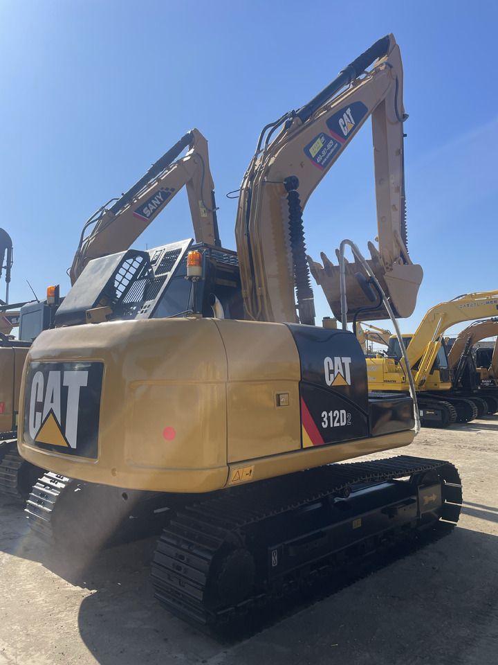 2024 Caterpillar 312D2 crawler excavator rear three-quarter view 2024 Caterpillar 312D2 crawler excavator rear three-quarter view