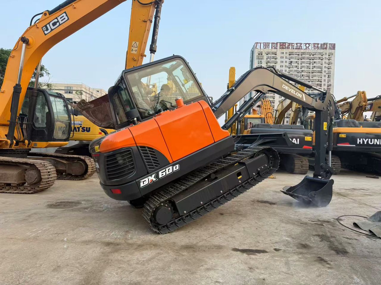 2025 Doosan DX60D-10 crawler excavator, rear three-quarter view 2025 Doosan DX60D-10 crawler excavator, rear three-quarter view