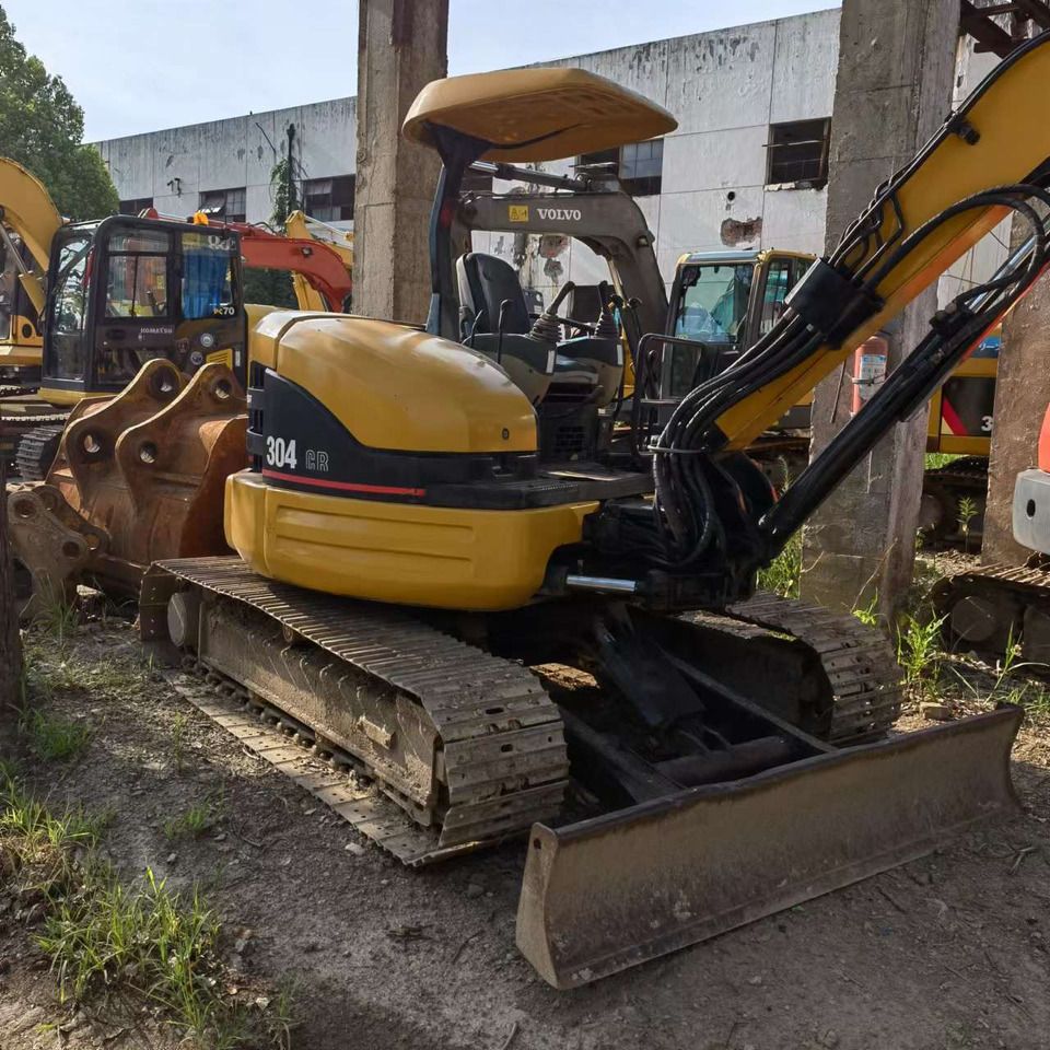 2023 Caterpillar 304 CR mini excavator, rear three-quarter view 2023 Caterpillar 304 CR mini excavator, rear three-quarter view