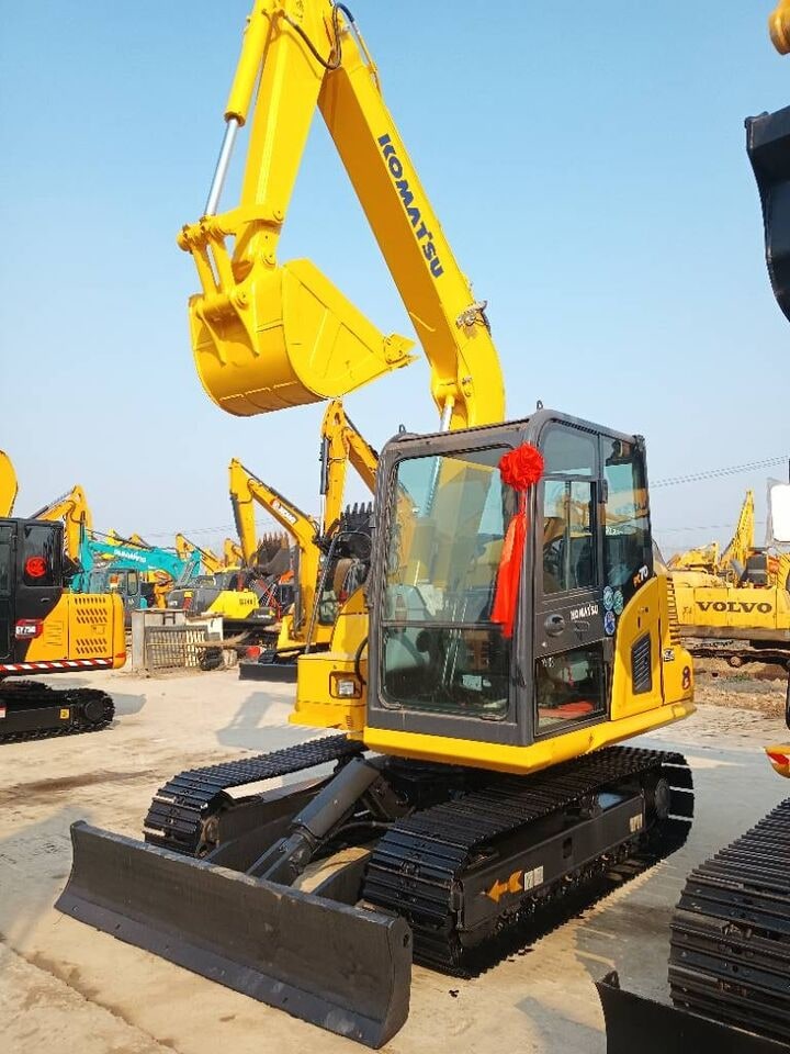 2025 Komatsu PC70 crawler excavator, front three-quarter view