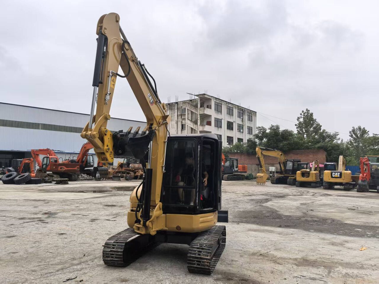 2022 Caterpillar 303.5E mini excavator, front three-quarter view 2022 Caterpillar 303.5E mini excavator, front three-quarter view