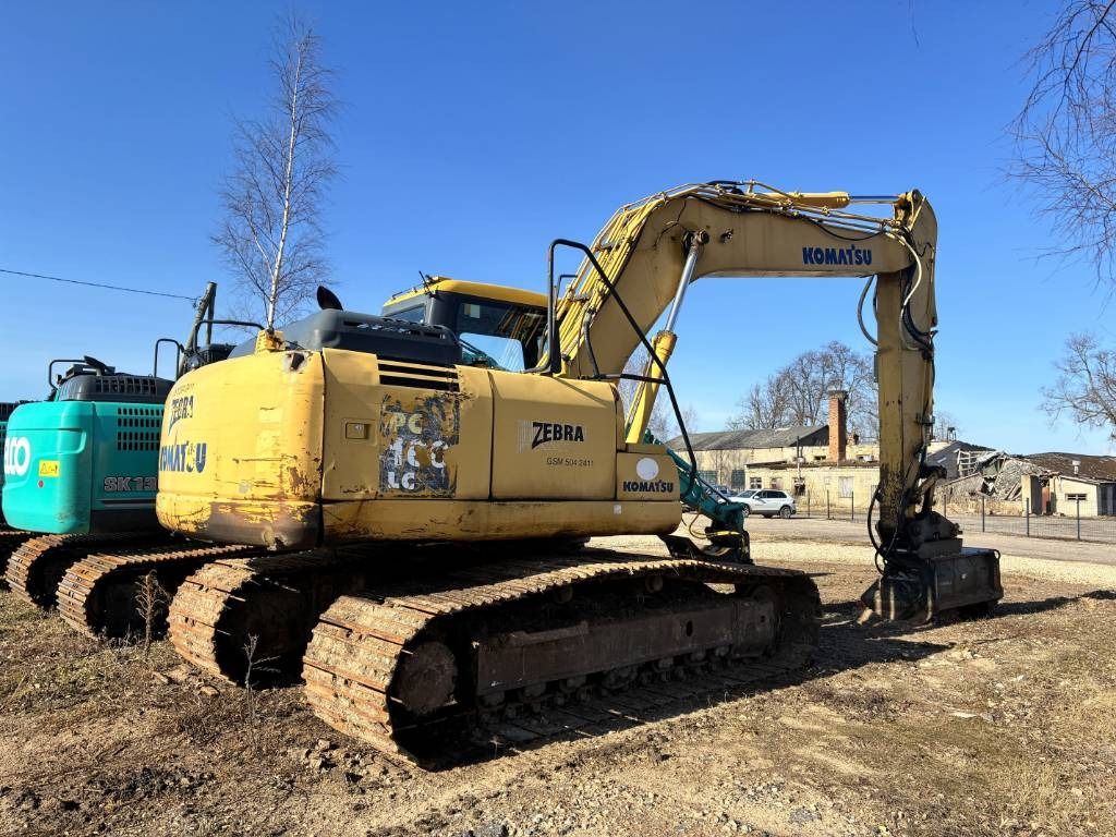 2008 Komatsu PC160LC-7 crawler excavator, rear three-quarter view 2008 Komatsu PC160LC-7 crawler excavator, rear three-quarter view
