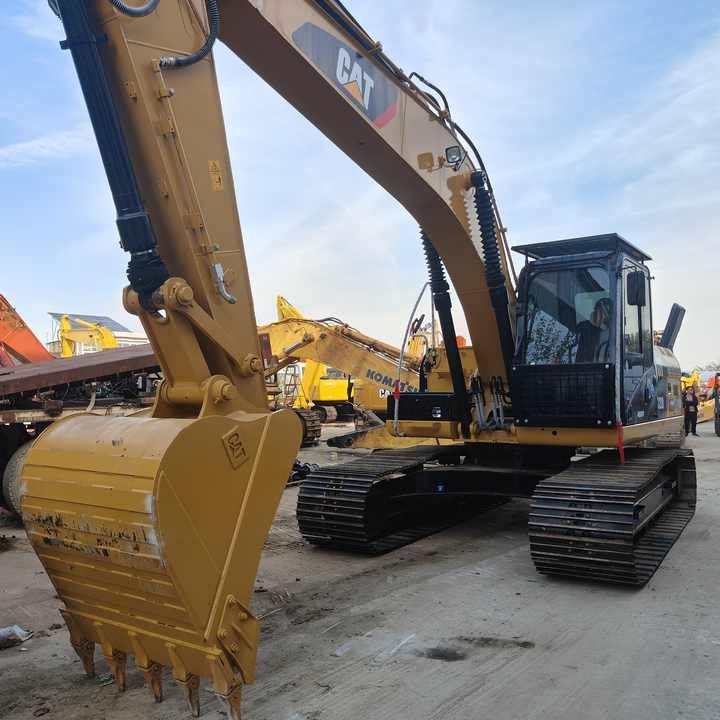 2016 Caterpillar 312D crawler excavator, front three-quarter view 2016 Caterpillar 312D crawler excavator, front three-quarter view