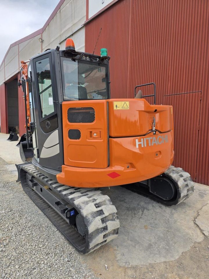2020 Hitachi ZX85USB-6 mini excavator rear three-quarter view 2020 Hitachi ZX85USB-6 mini excavator rear three-quarter view