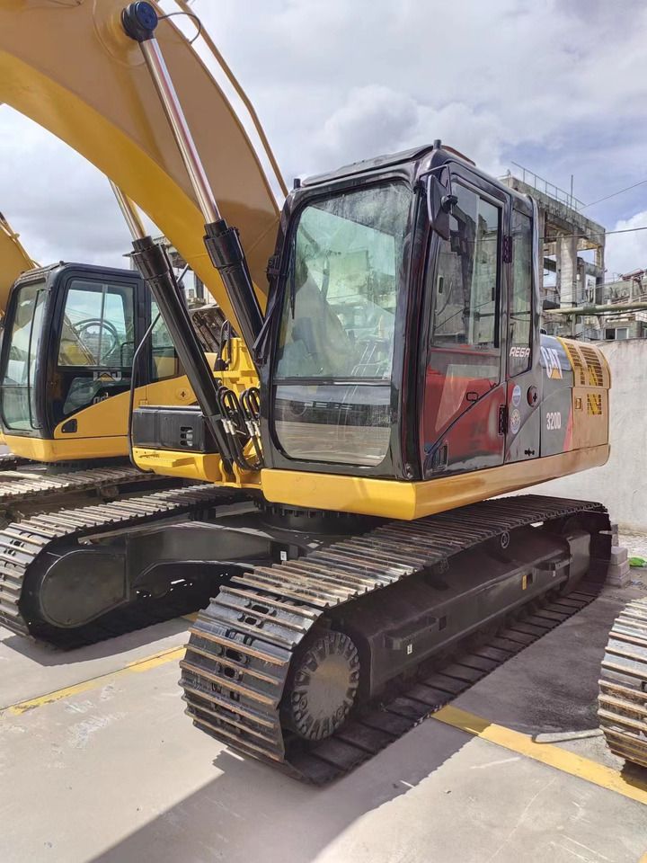 2018 Caterpillar 320D гусеничний екскаватор, боковий вигляд 2018 Caterpillar 320D гусеничний екскаватор, боковий вигляд
