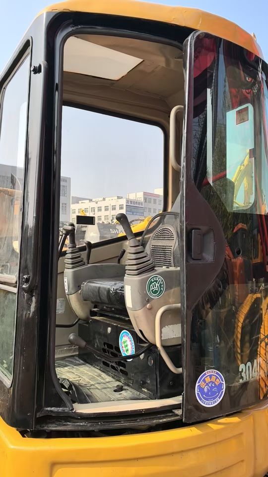 2022 Caterpillar 304 crawler excavator cab interior view 2022 Caterpillar 304 crawler excavator cab interior view