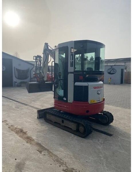2019 Takeuchi TB23R mini excavator, rear three-quarter view 2019 Takeuchi TB23R mini excavator, rear three-quarter view