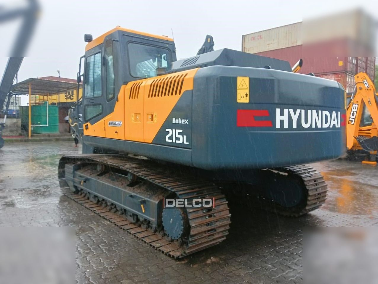 2026 Hyundai Robex 215L crawler excavator, rear three-quarter view 2026 Hyundai Robex 215L crawler excavator, rear three-quarter view