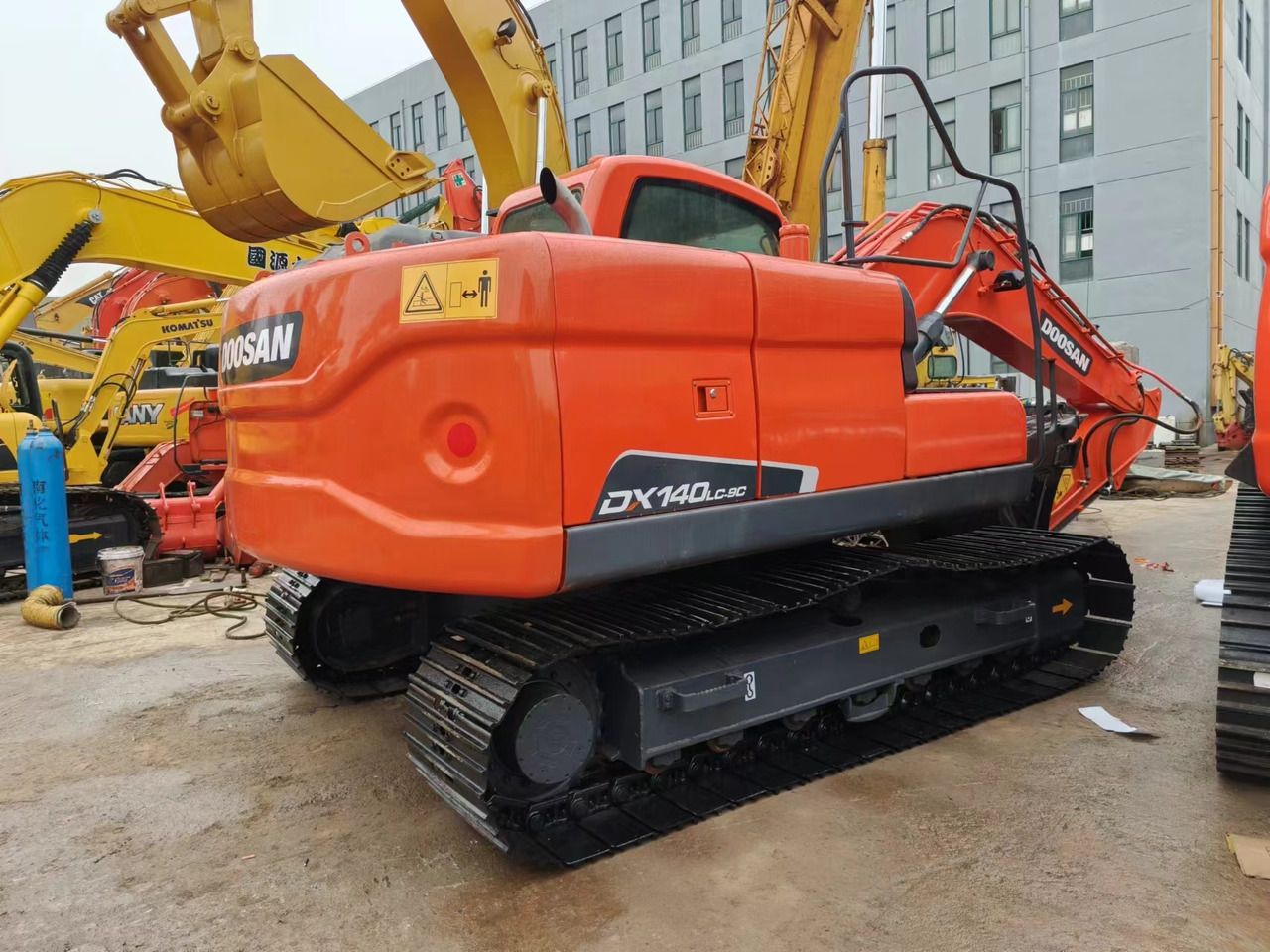2023 Doosan DX140LC-9C excavator rear three-quarter view