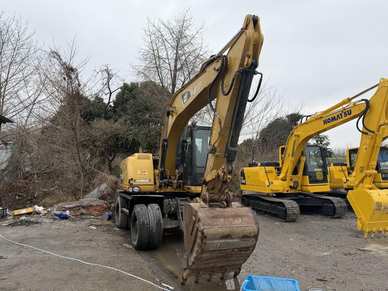 2018 Caterpillar M312D2 wheel excavator, front three-quarter view 2018 Caterpillar M312D2 wheel excavator, front three-quarter view