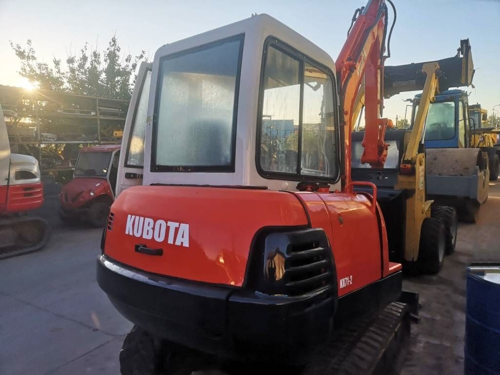 2002 Kubota KX71-2 mini excavator, rear three-quarter view 2002 Kubota KX71-2 mini excavator, rear three-quarter view