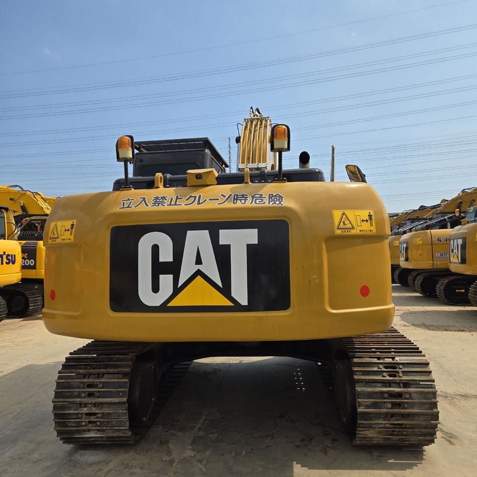 2023 Caterpillar 323D2L crawler excavator, rear view