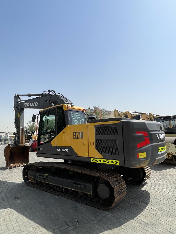 2025 Volvo EC210 crawler excavator, rear three-quarter view