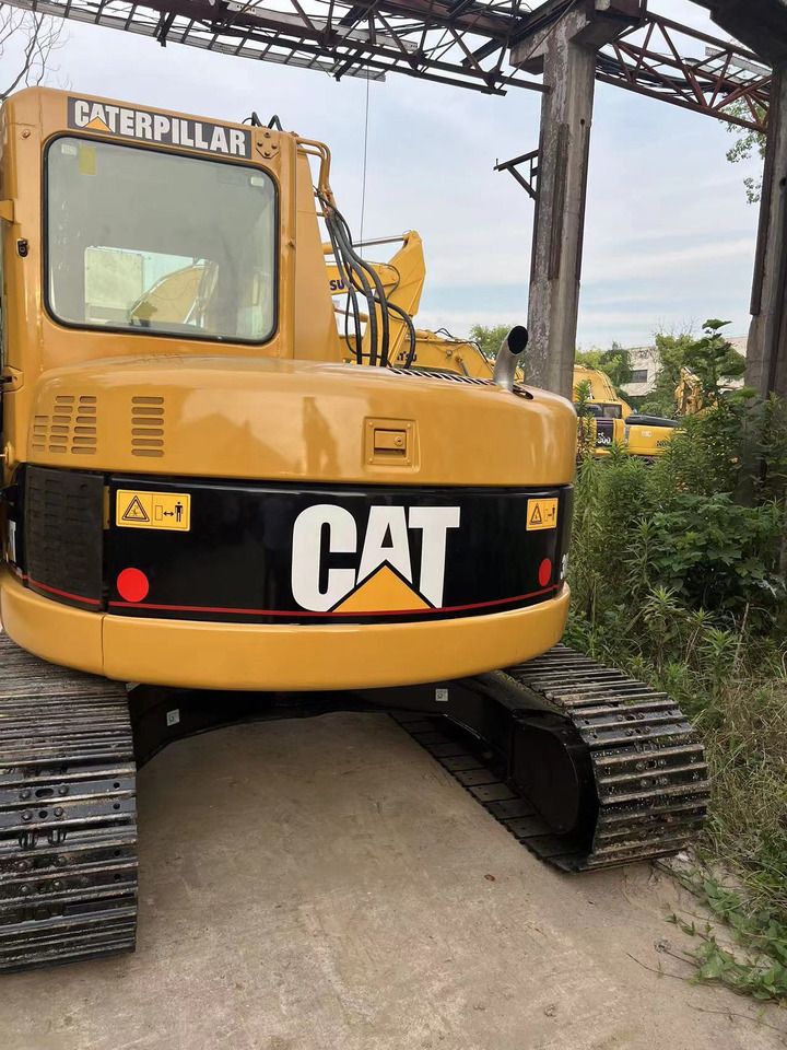Caterpillar 308C excavator rear view Caterpillar 308C excavator rear view