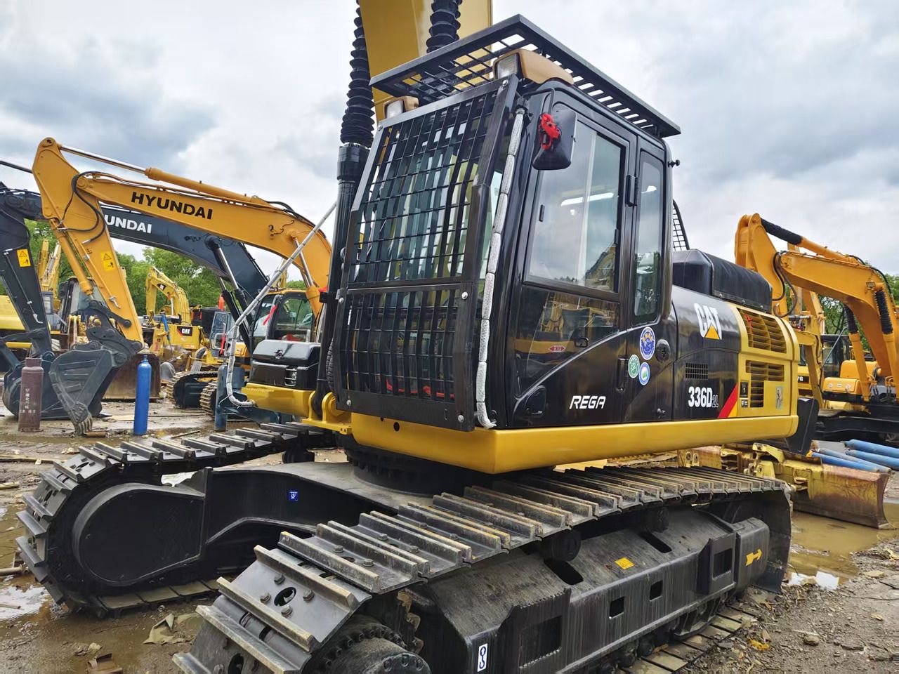2020 Caterpillar 336D crawler excavator, side view of cab and tracks