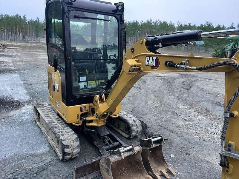 2023 Caterpillar 302 mini excavator, front three-quarter view
