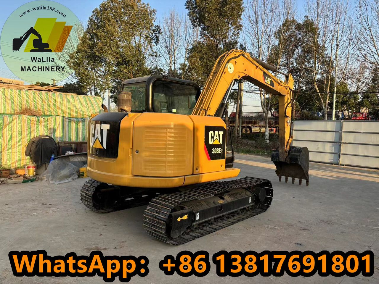 2022 Caterpillar 308E2CR mini excavator, rear three-quarter view