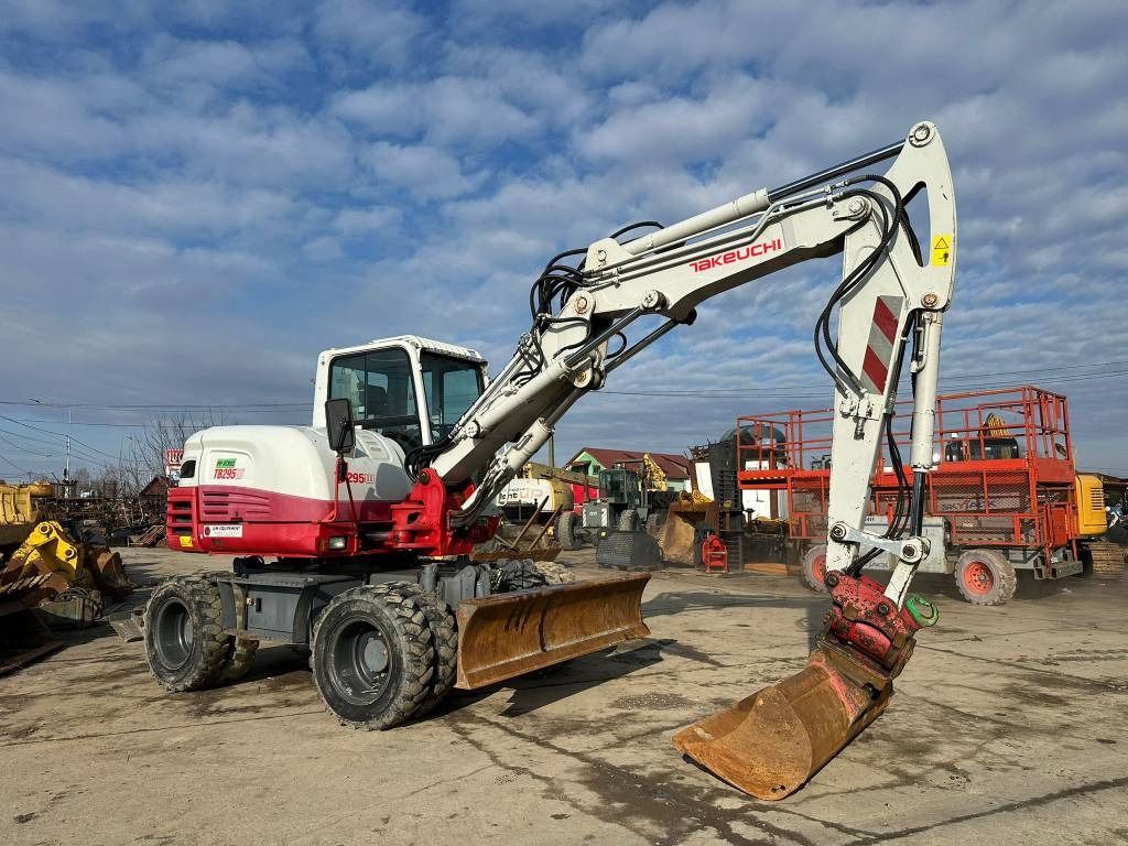 2018 Takeuchi TB295W wheel excavator, front three-quarter view 2018 Takeuchi TB295W wheel excavator, front three-quarter view