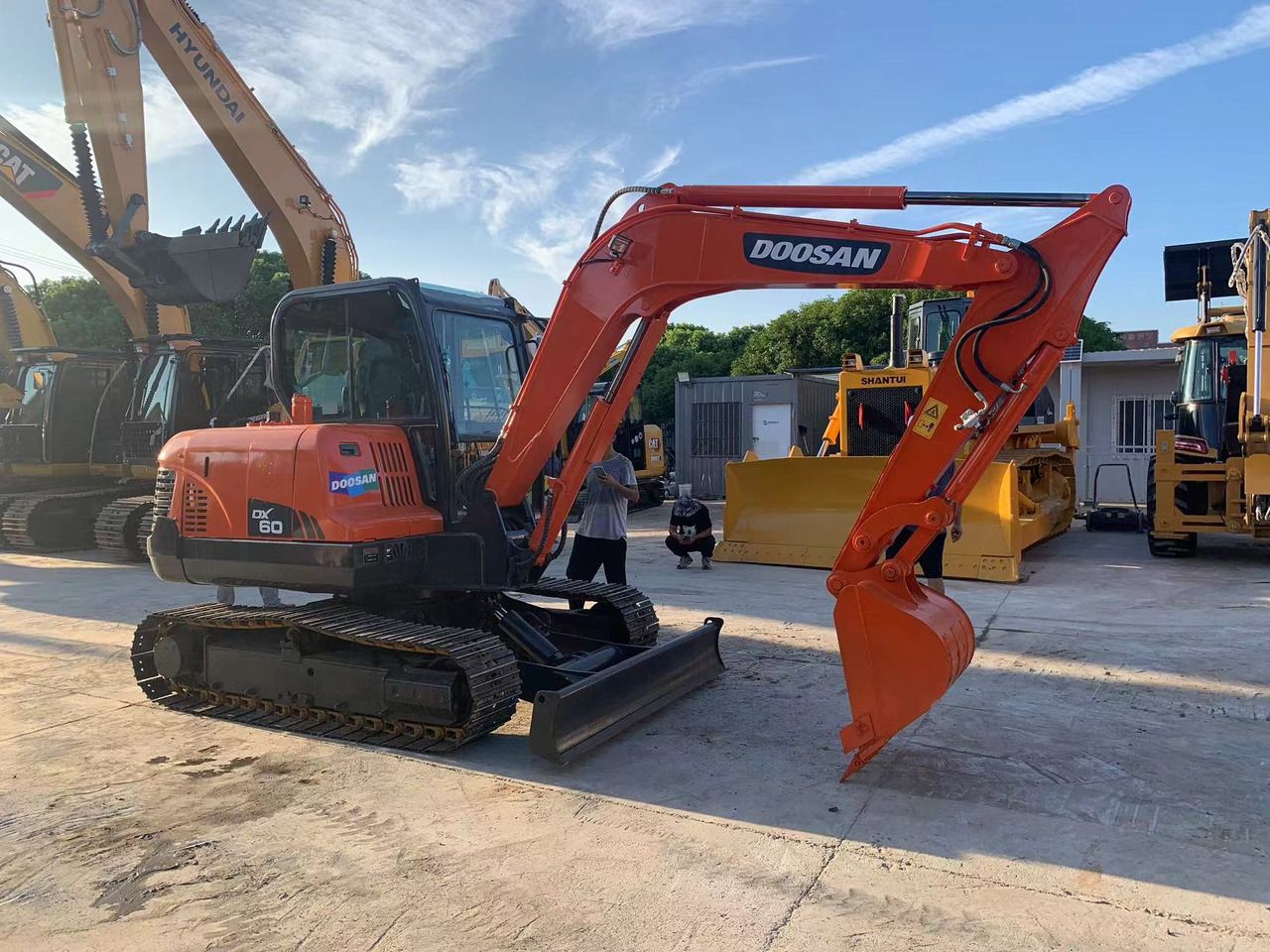 2021 Doosan DX60 mini excavator, side view 2021 Doosan DX60 mini excavator, side view