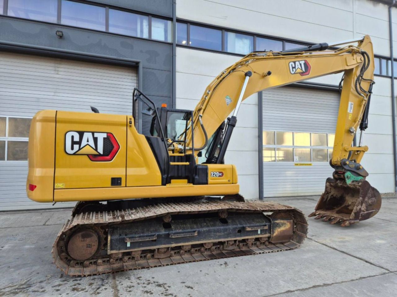 2023 Caterpillar 320GC crawler excavator, side view