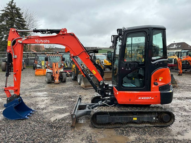 2023 Kubota KX037-4 mini excavator, side view 2023 Kubota KX037-4 mini excavator, side view