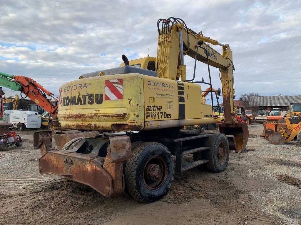 1998 Komatsu PW170ES wheel excavator, rear three-quarter view 1998 Komatsu PW170ES wheel excavator, rear three-quarter view